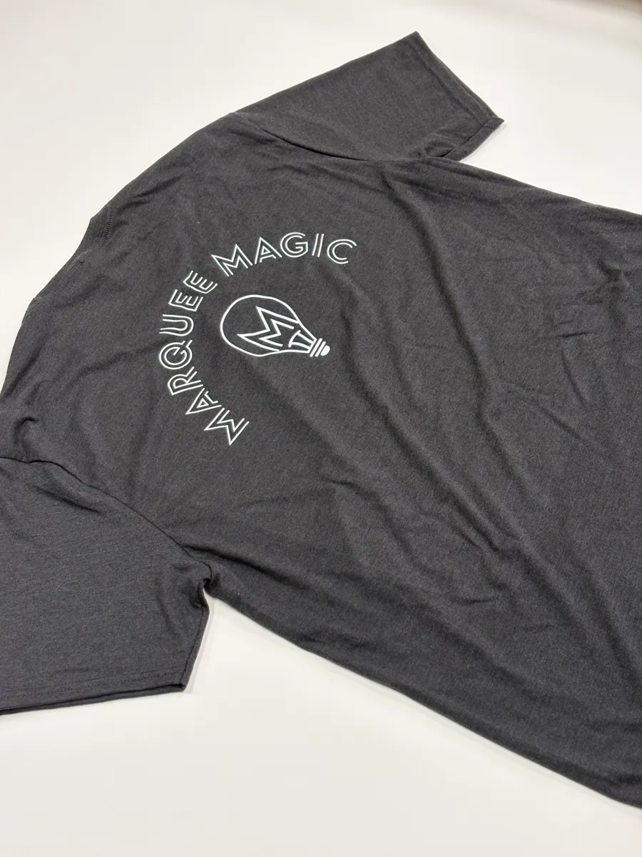 DTF printed event shirts laid out for a promotion run