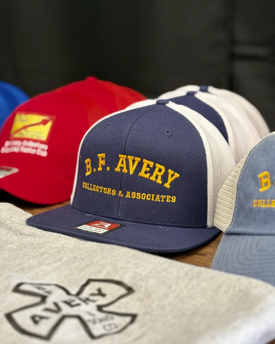 Custom headwear lineup with embroidered branding