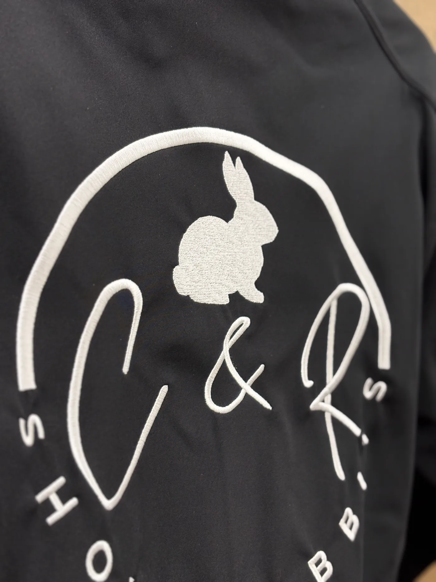 Embroidered apparel on display ready for pickup