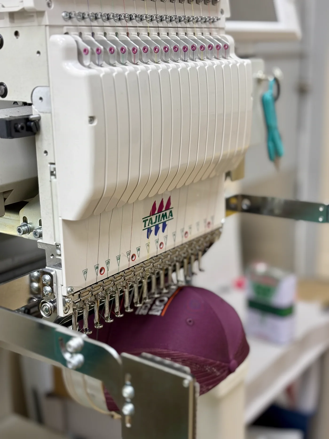 Finished embroidered apparel prepared for pickup