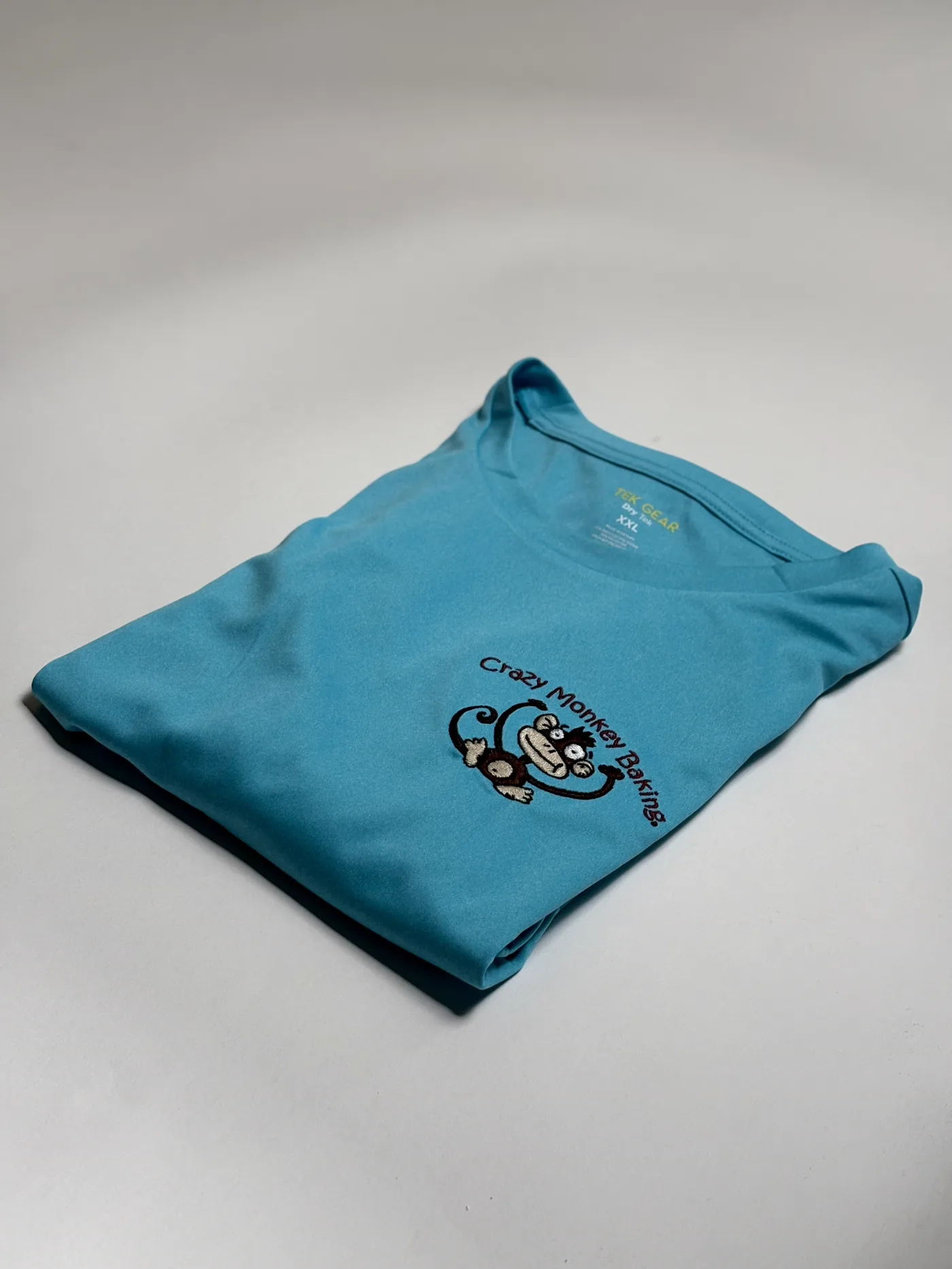 Custom merch artwork prepared for a branded store launch