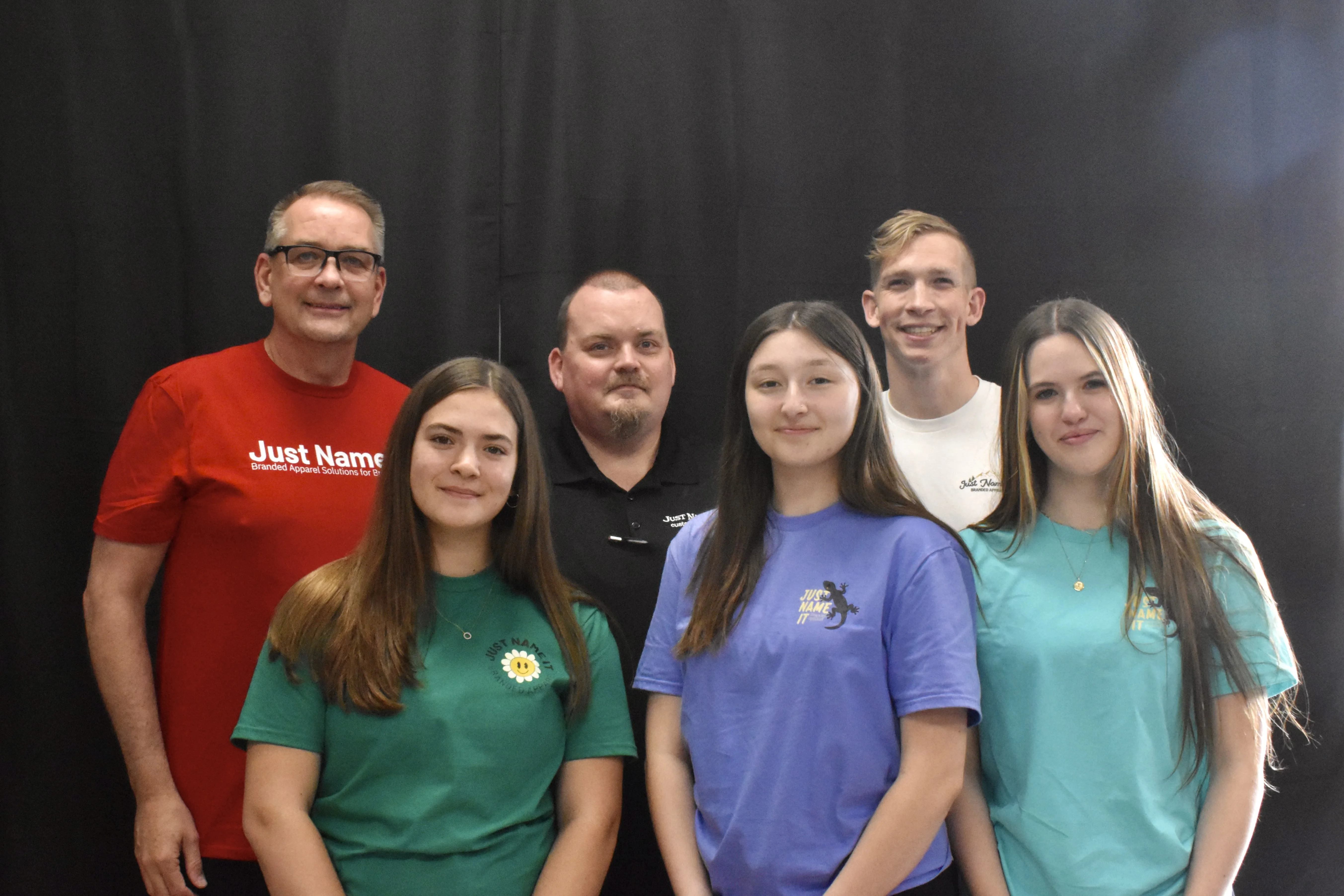 The Just Name It team together