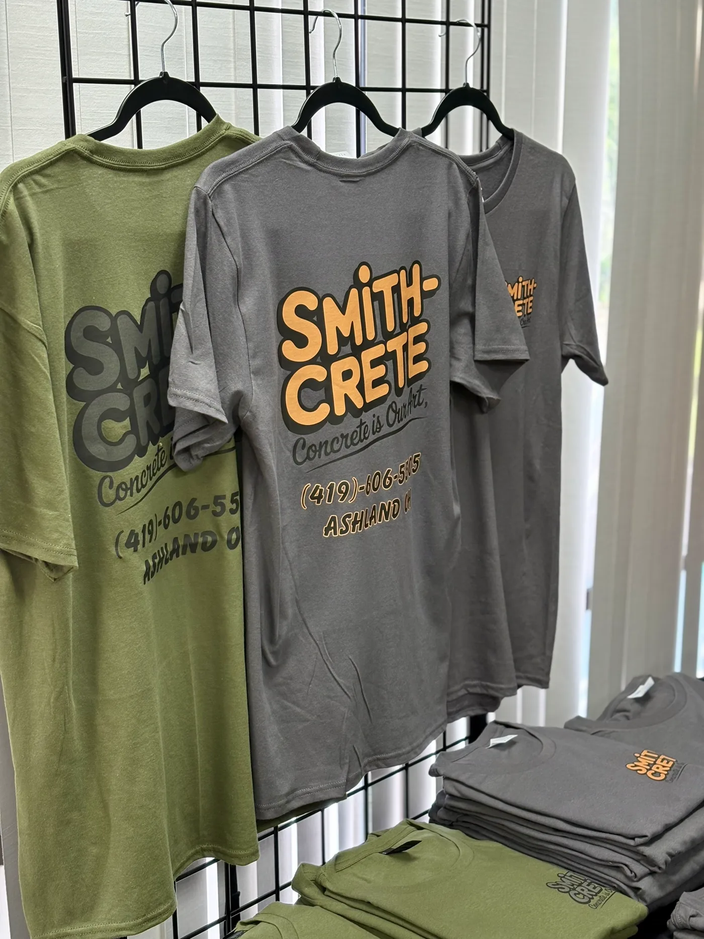 Bulk custom apparel order prepared for a business event